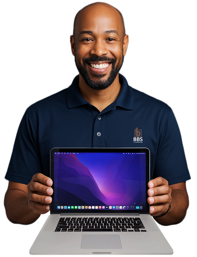 BBS IT Consulting managed help desk specialist holding laptop